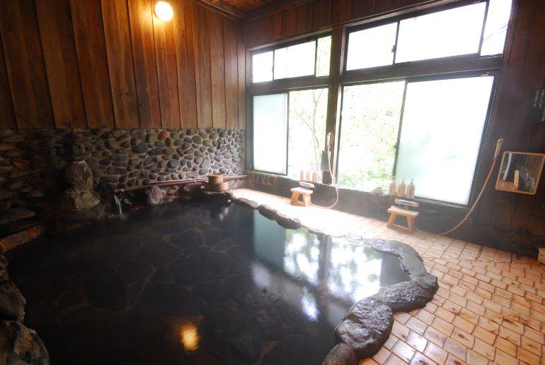 Inside of a Yu-goya, separate men's and women's bathhouse  Men's bath